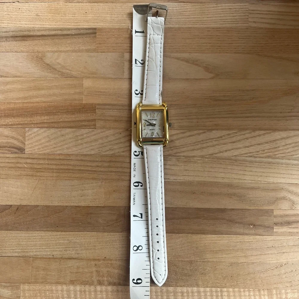 Côte d azur ladies white dial gold tone dress watch NEW BATTERY